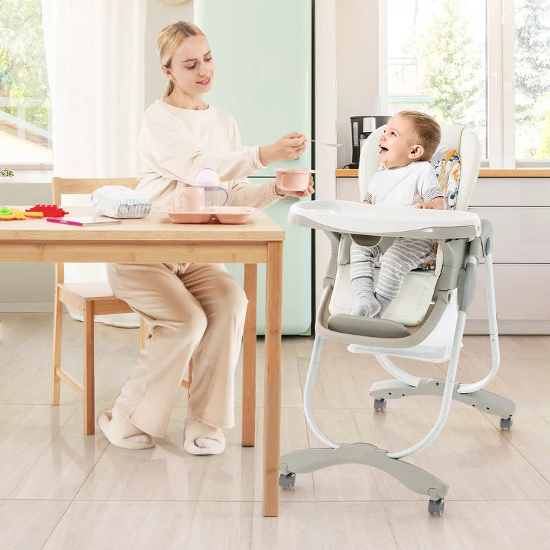 Multifunctional Folding Baby High Chair with Rolling Wheels and Adjustable Height by DirectDeals
