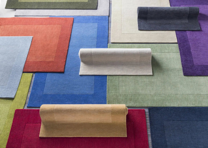 Bordered Solid Beige Wool Rug by Boutique Rugs