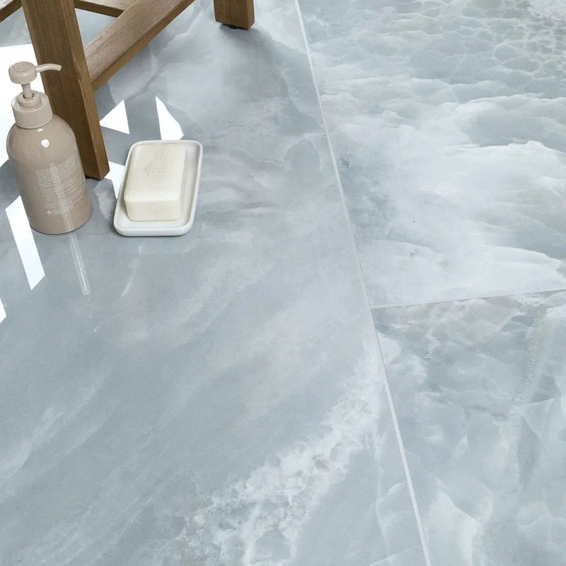 Exotika Biotite Polished Marble Look Porcelain Tiles 24x48 in a finished room