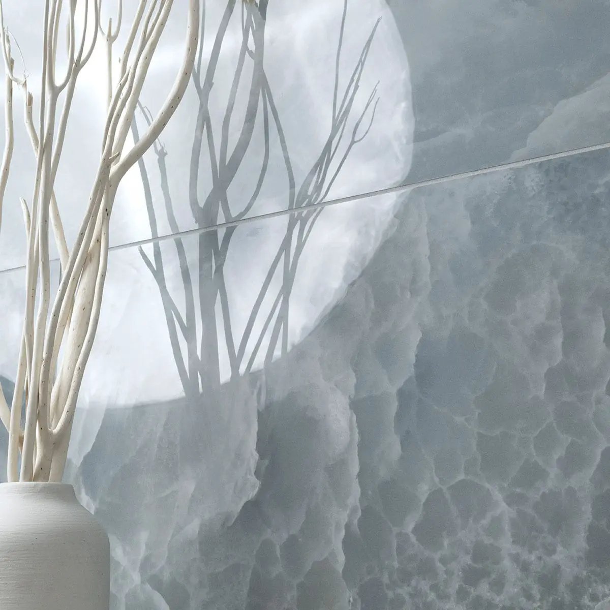 Exotika Biotite Polished Marble Look Porcelain Tiles 24x48 in a finished room