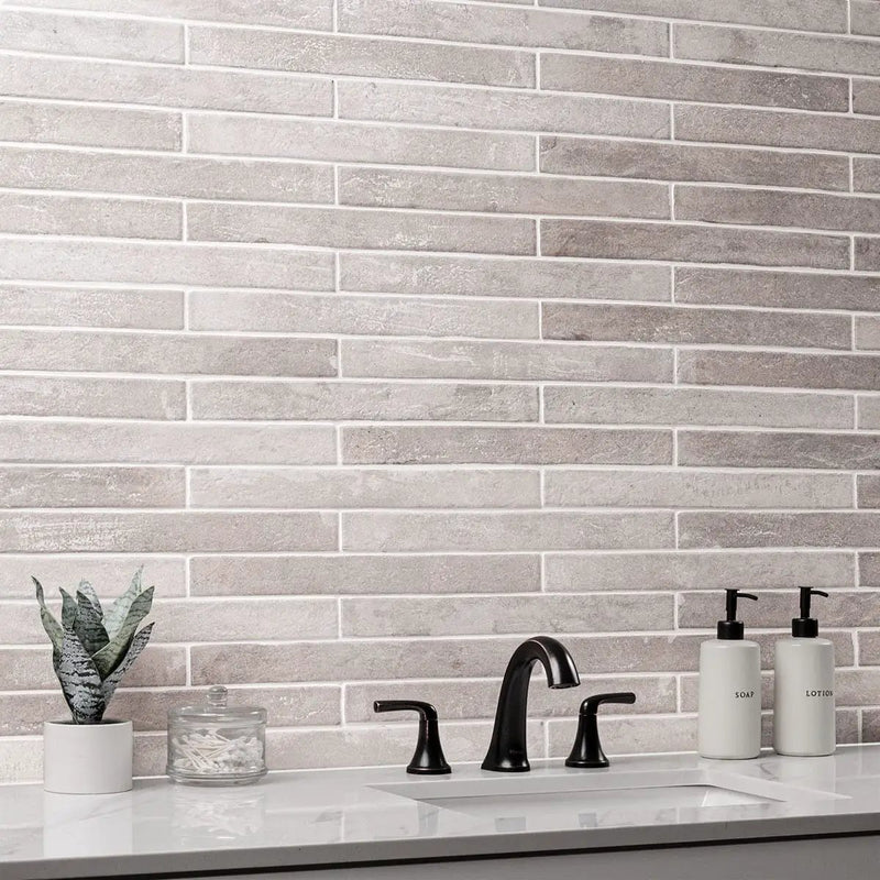 Brickstone Ivory Porcelain Tile 2x10 Matte Brick Mosaics in a finished room