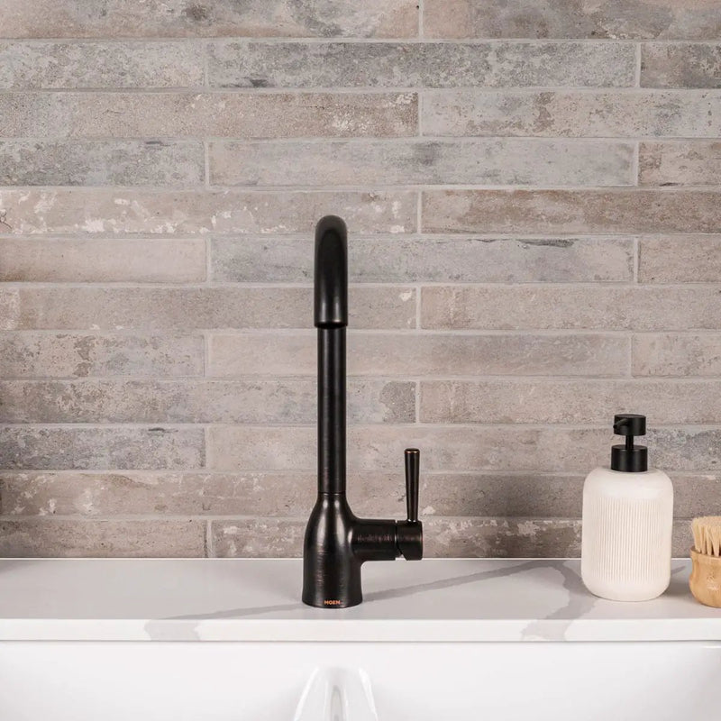 Brickstone Taupe Brick 2x18 Matte Porcelain Mosaics in a finished room