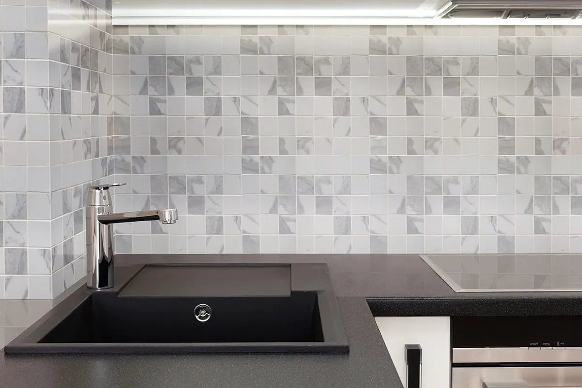 Eden Statuary Polished Marble Look Porcelain Tiles 12x24 in a finished room