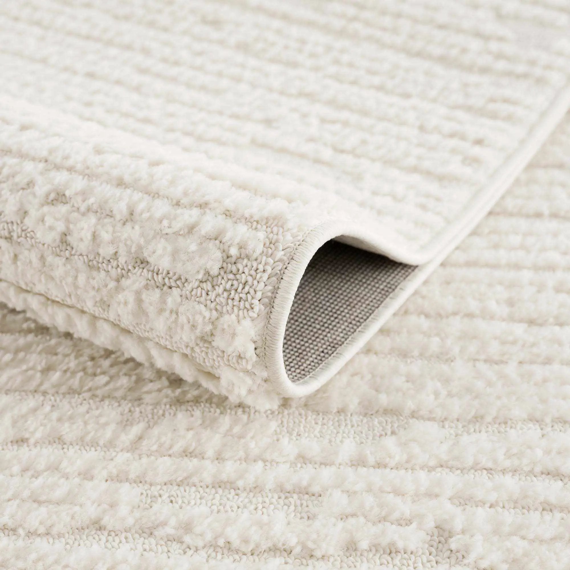 Kulu Textured Area Rug with Tassels by Boutique Rugs
