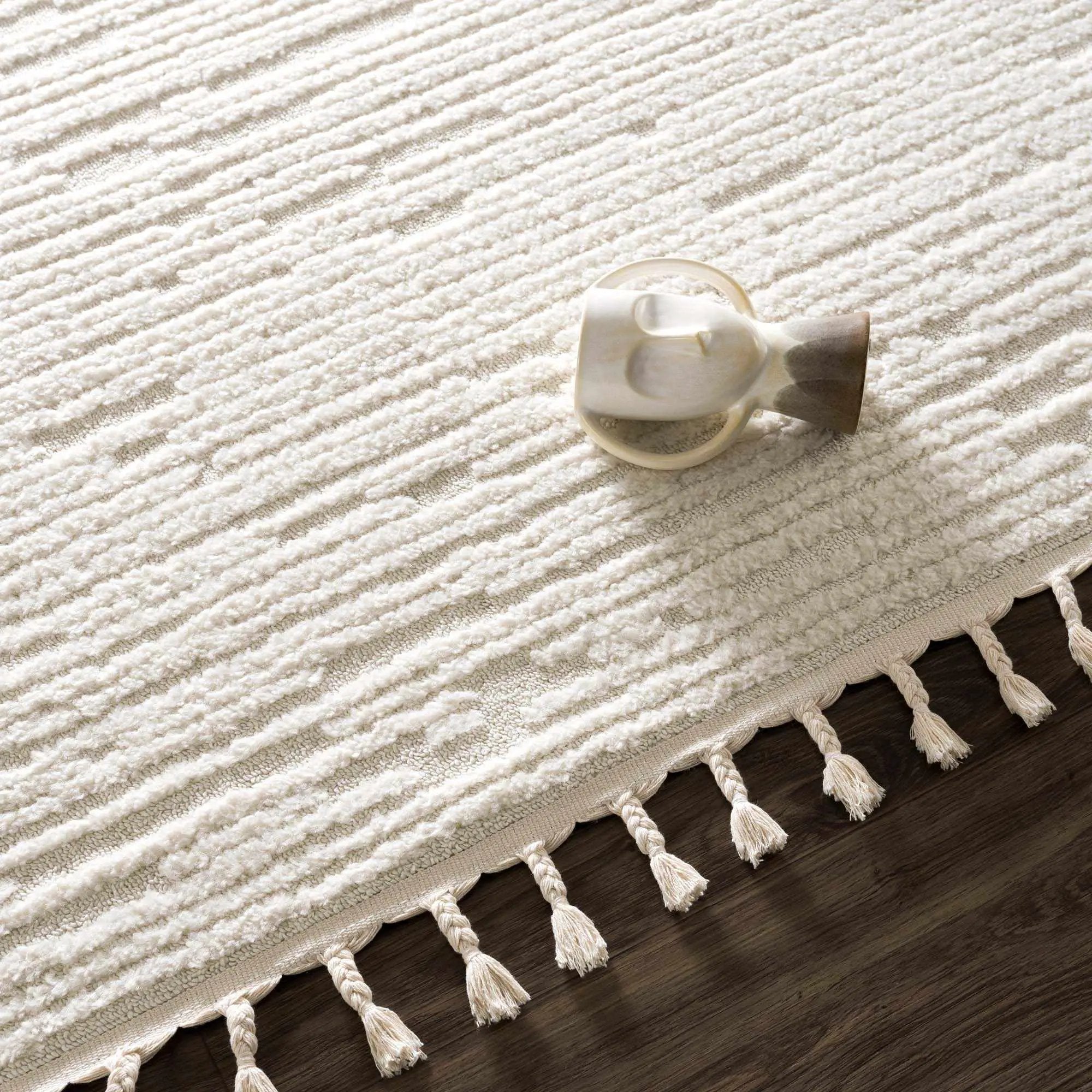 Kulu Textured Area Rug with Tassels by Boutique Rugs
