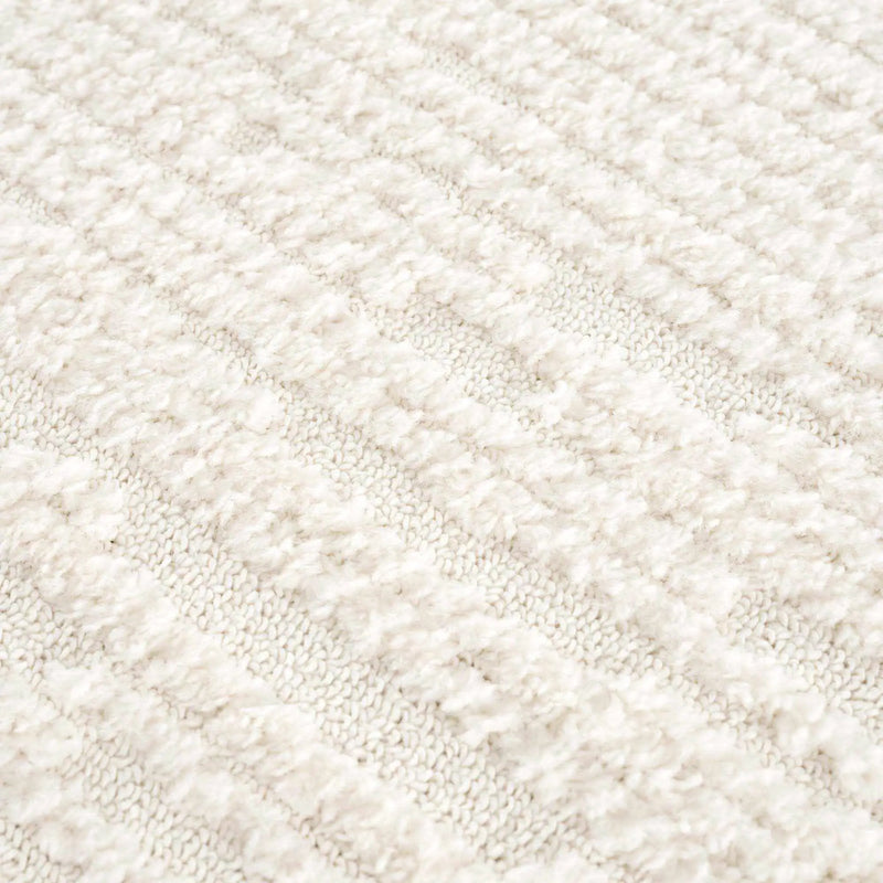 Kulu Textured Area Rug with Tassels by Boutique Rugs