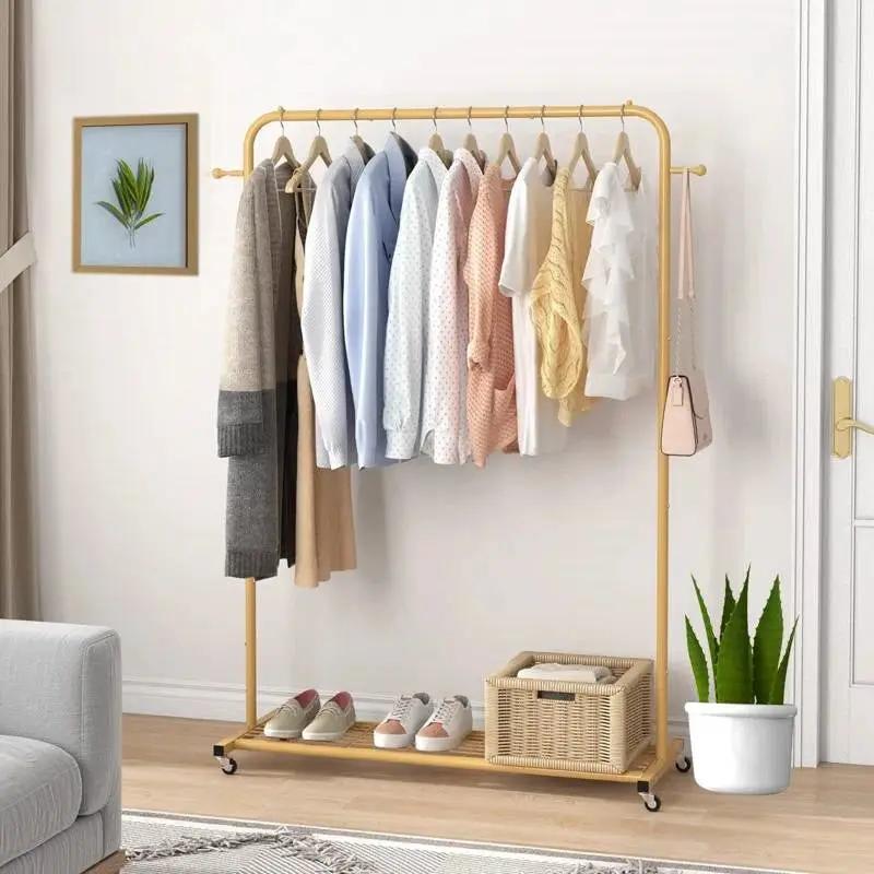 Modern Garment Rack Clothes Hanging Rod with Lockable Wheels in Gold by HomePacific
