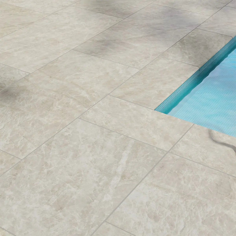 Legions Taja Ivory Matte Porcelain Pool Copings 13x24 in a finished room