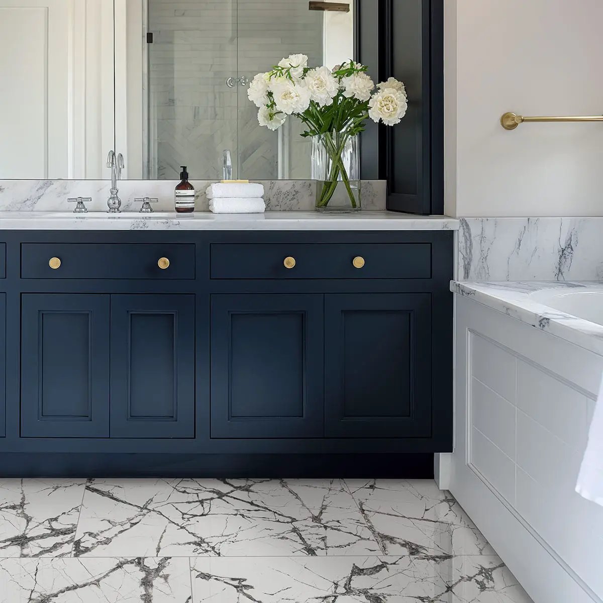 Exotika Lux Iceberg 24x48 Polished Marble Look Porcelain Tiles in a finished room
