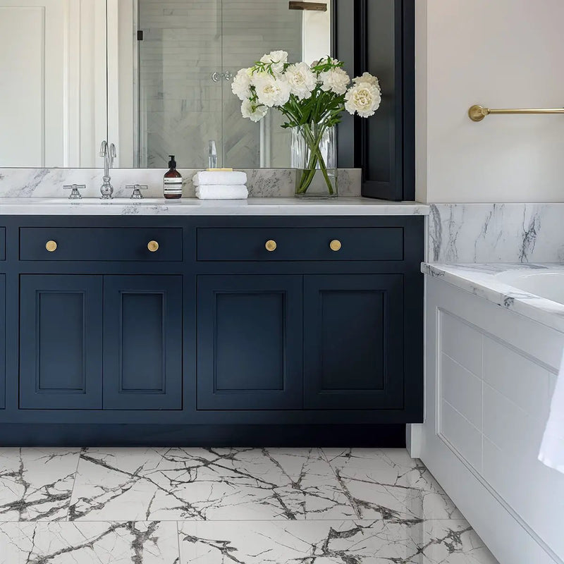 Exotika Lux Iceberg 24x48 Polished Marble Look Porcelain Tiles in a finished room