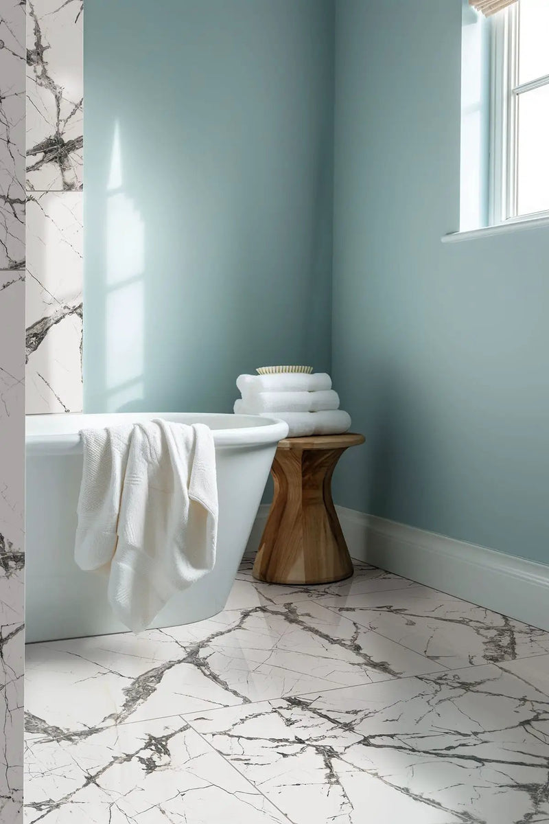 Exotika Lux Iceberg 24x48 Polished Marble Look Porcelain Tiles in a finished room