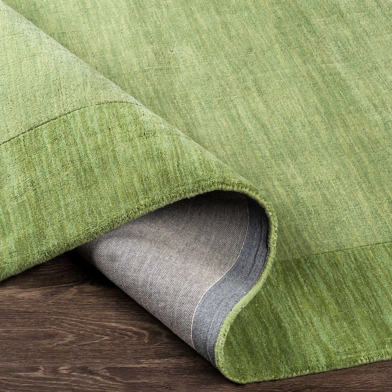 Bordered Solid Green Wool Rug by Boutique Rugs