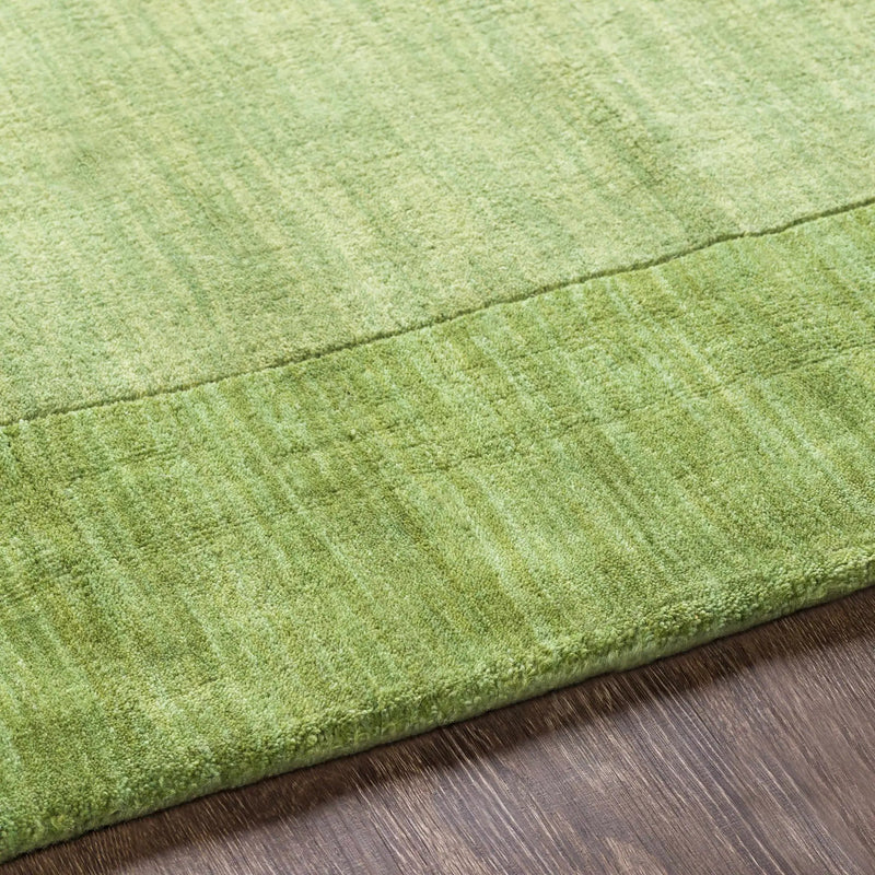 Bordered Solid Green Wool Rug by Boutique Rugs