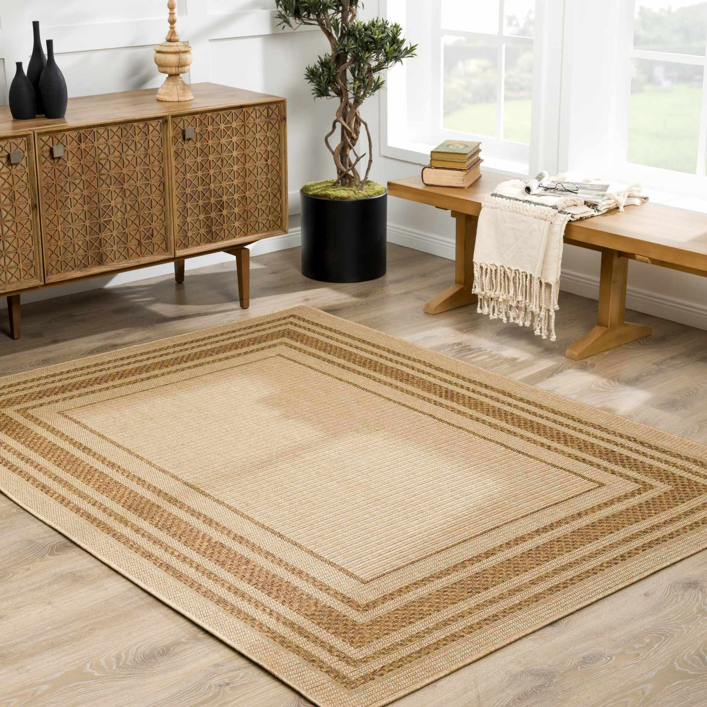 Isoko Bordered Faux Jute Outdoor Rug by Boutique Rugs
