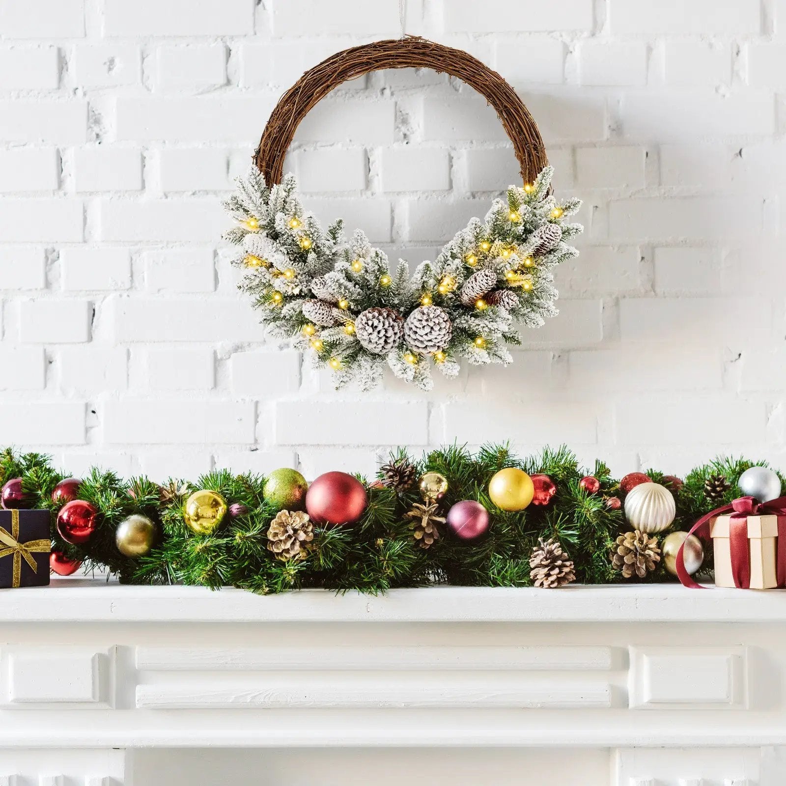 Pre-lit Snow Flocked Artificial Christmas Wreath with 8 Pine Cones and 35 LED Lights by DirectDeals
