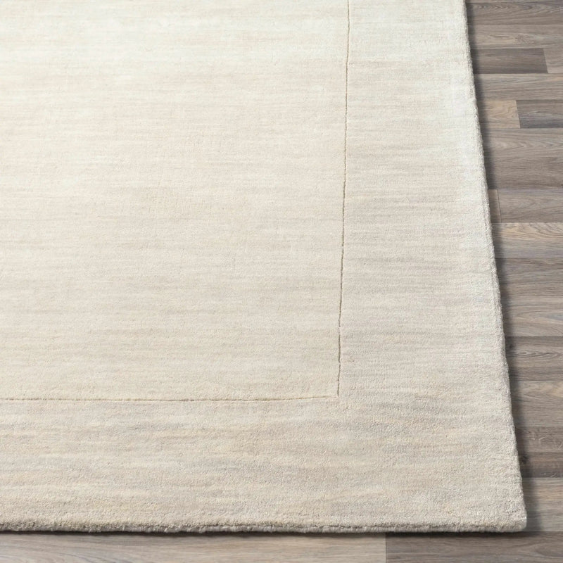 Bordered Solid Beige Cream Wool Rug by Boutique Rugs