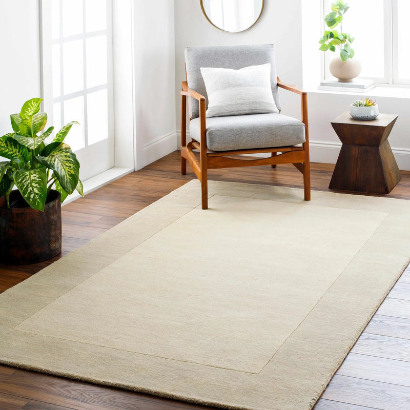 Bordered Solid Beige Cream Wool Rug by Boutique Rugs