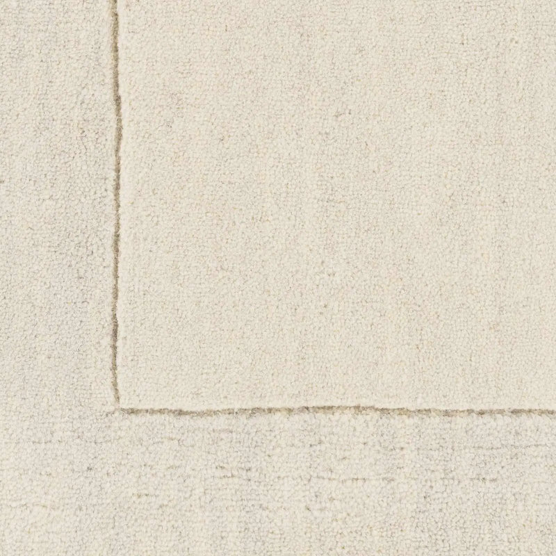 Bordered Solid Beige Cream Wool Rug by Boutique Rugs