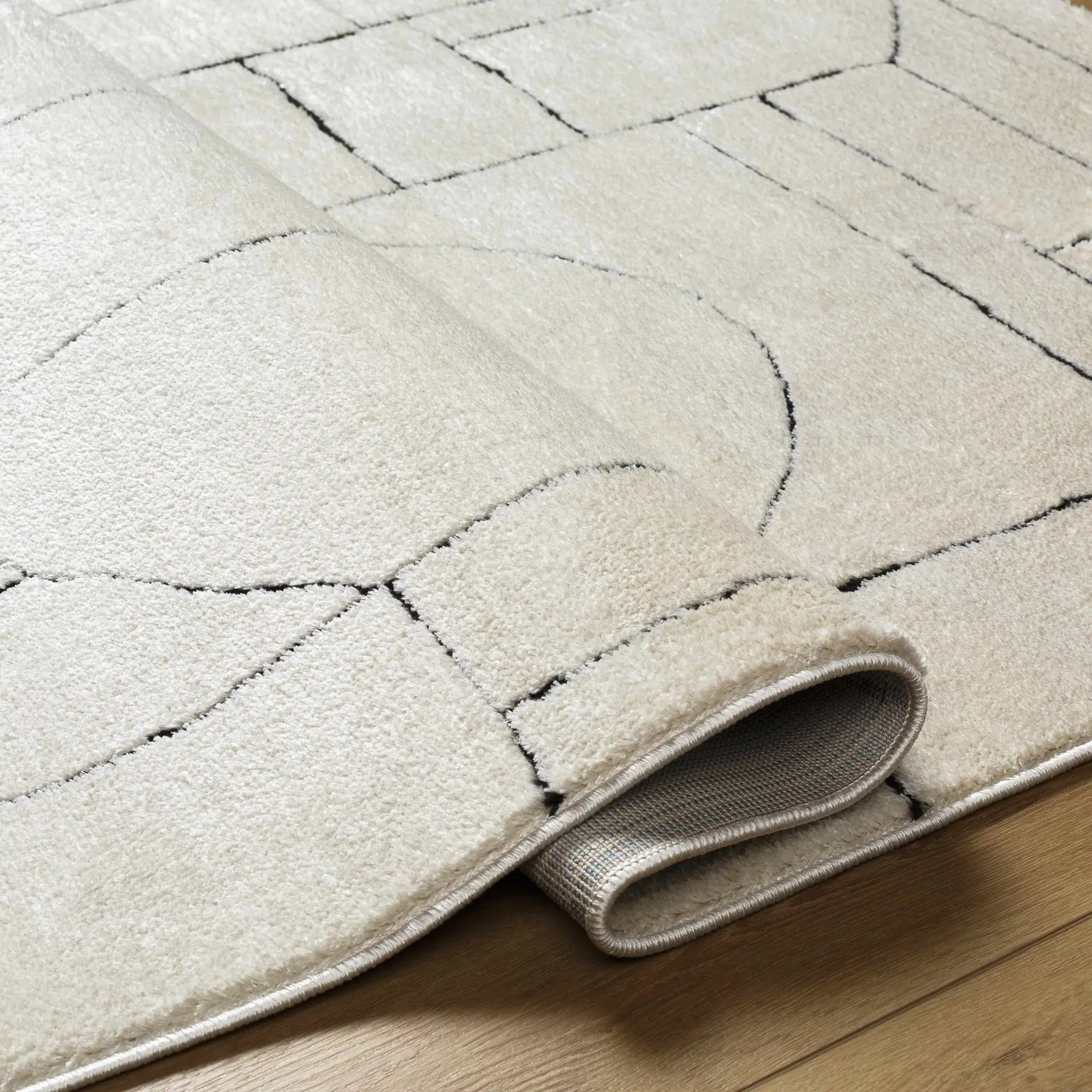 Keats Black & White Area Rug by Boutique Rugs