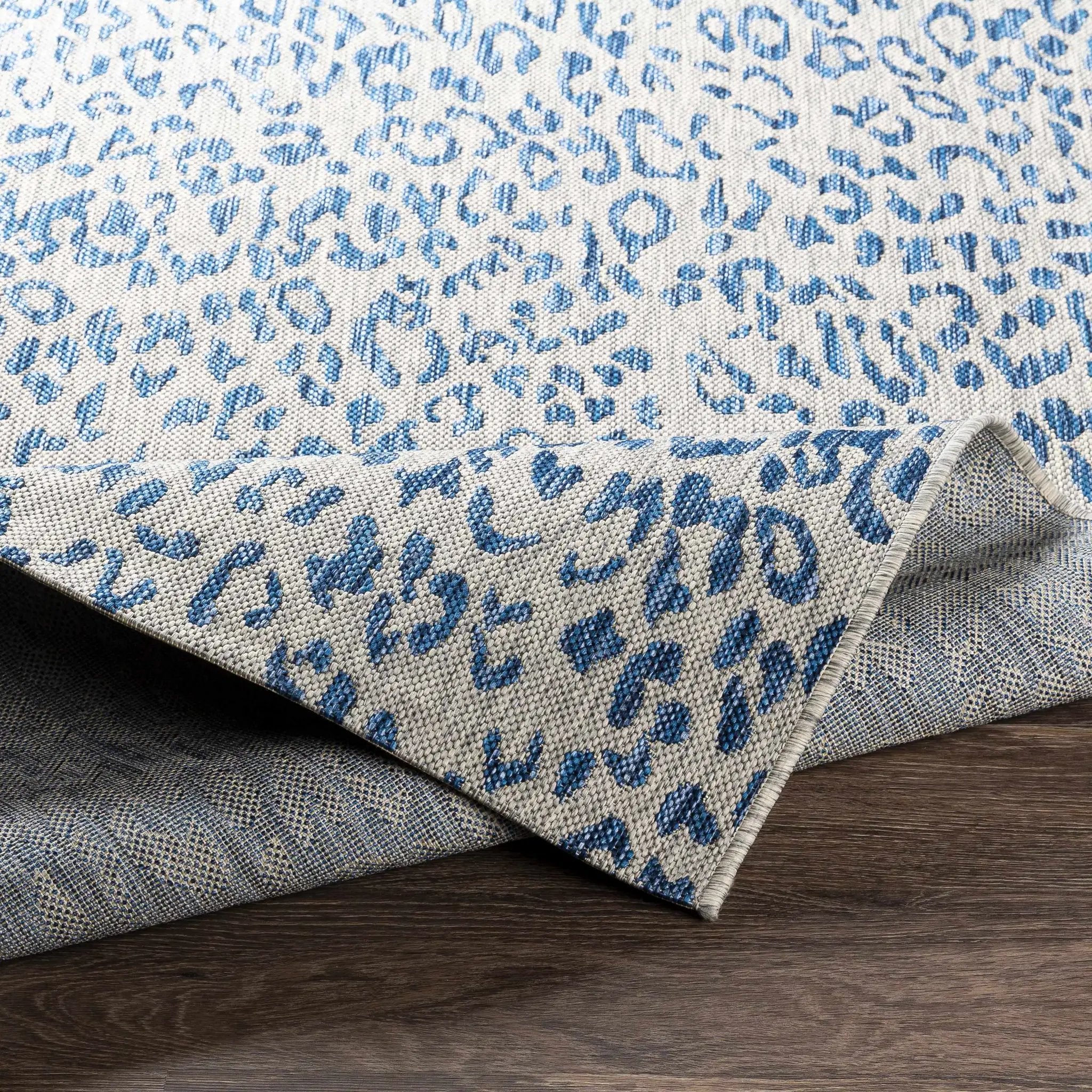 Skipsea Blue Leopard Performance Outdoor Rug by Boutique Rugs
