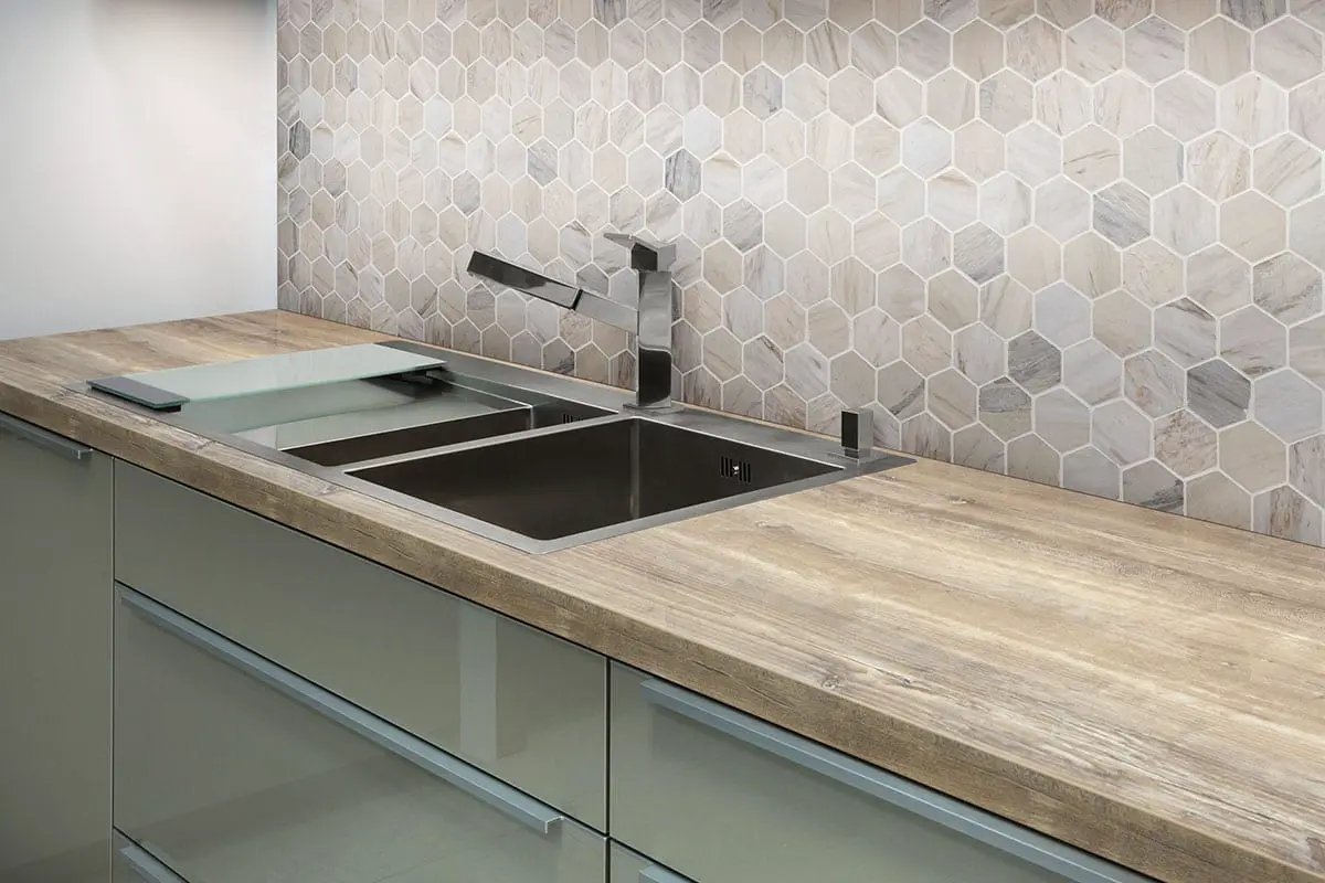 Angora Polished 2" Hexagon Mosaic Tile Marble in a finished room