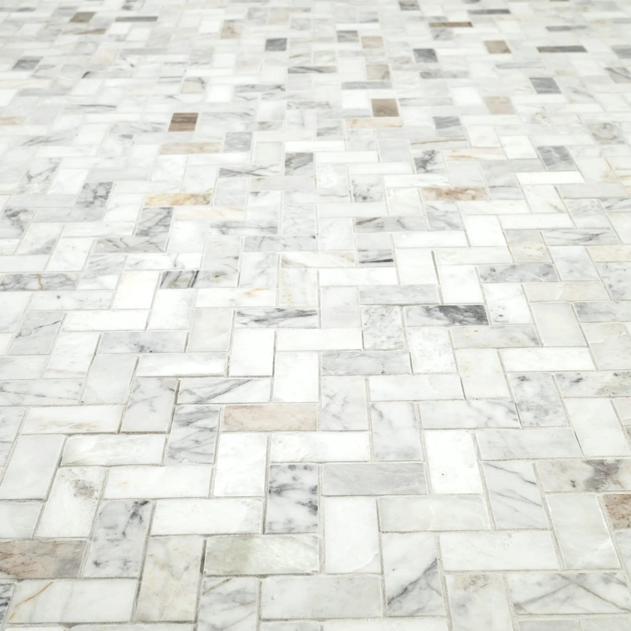 Arabescato Venato 1x2 Herringbone Honed Marble Mosaics angled view