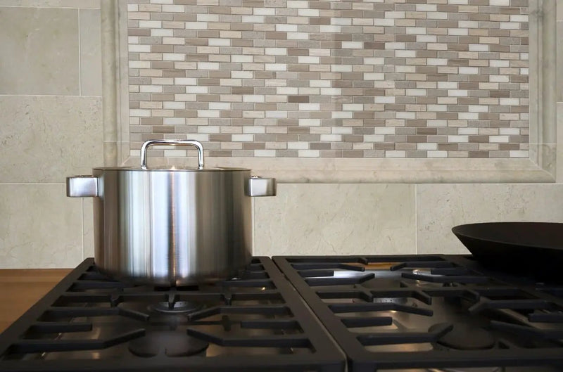 Arctic Storm 0.625x2 Brick Pattern Honed Marble Mosaics in a finished room