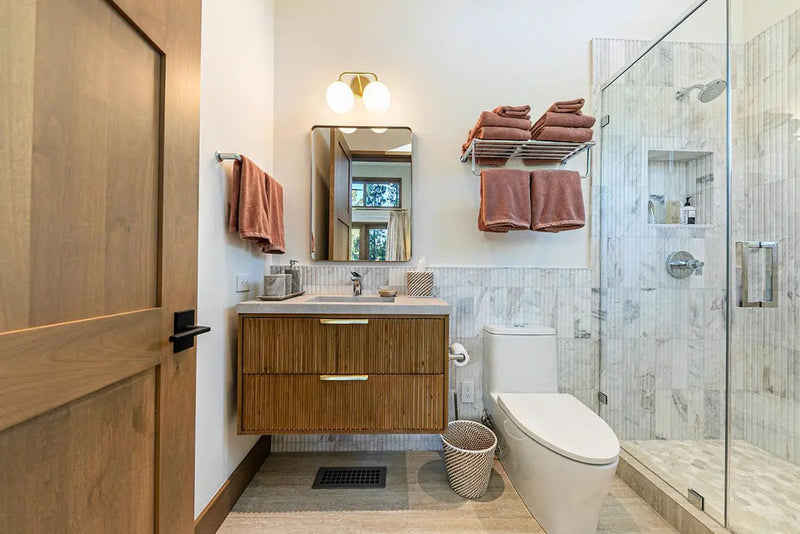 Athena Gold 2" Hexagon Honed Marble Mosaics in a finished room