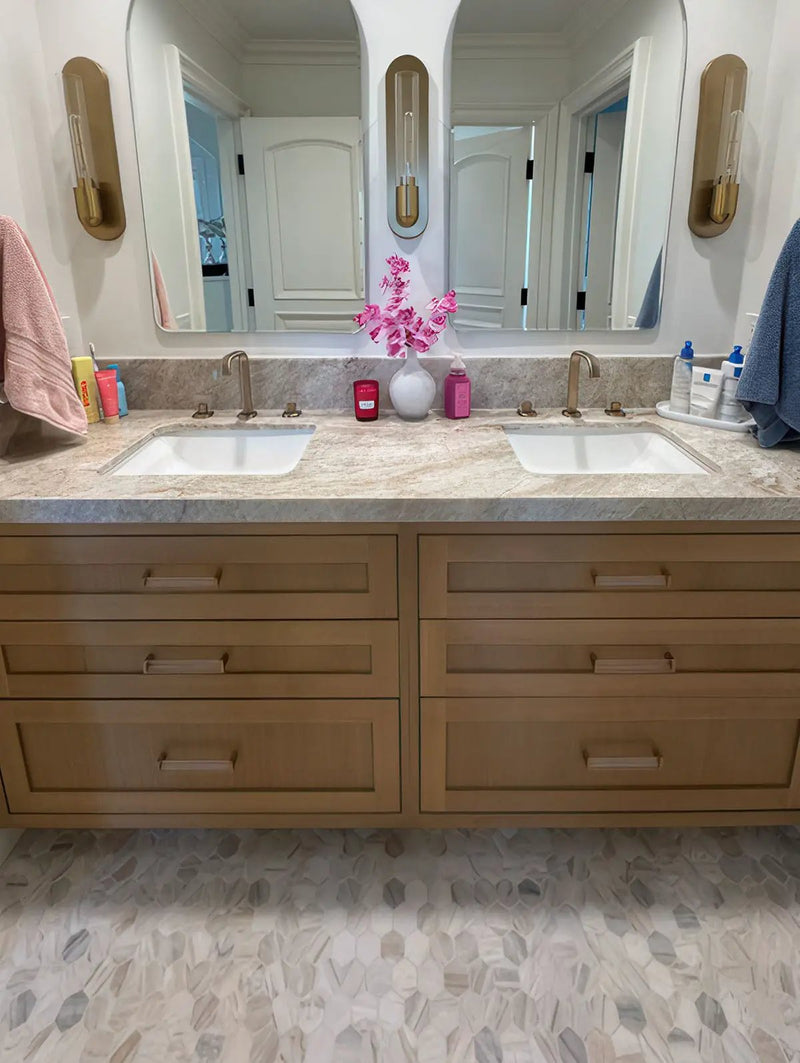 Athena Gold 2" Hexagon Honed Marble Mosaics in a finished room