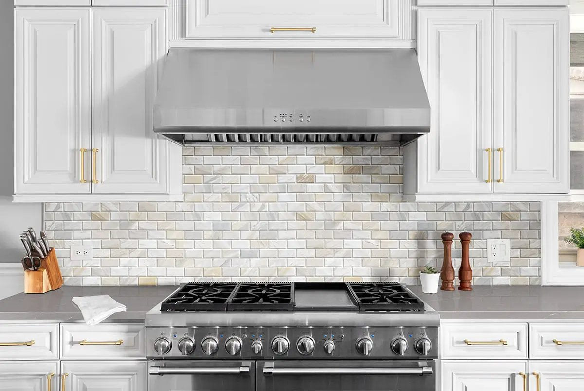Athena Gold Beveled Tile 2x4 Honed Marble Mosaics in a finished room