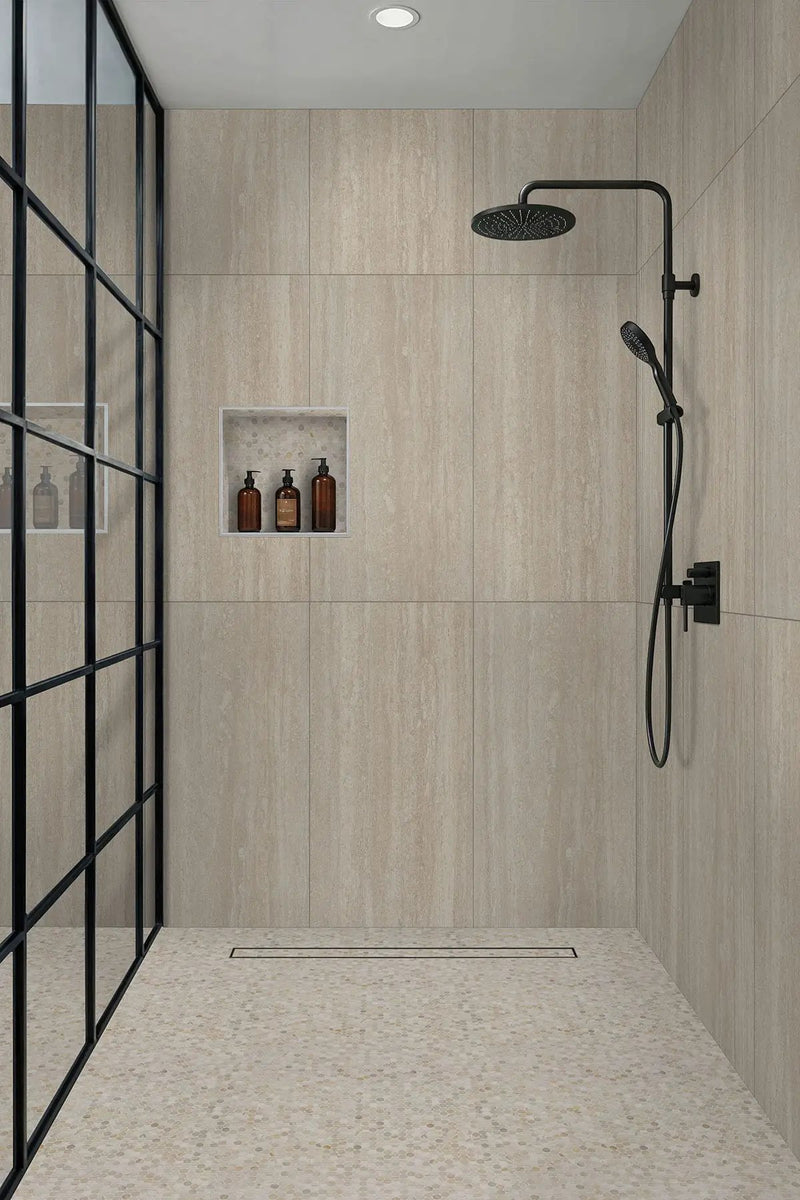 Athena Gold Penny Round Honed Marble Mosaics in a finished room
