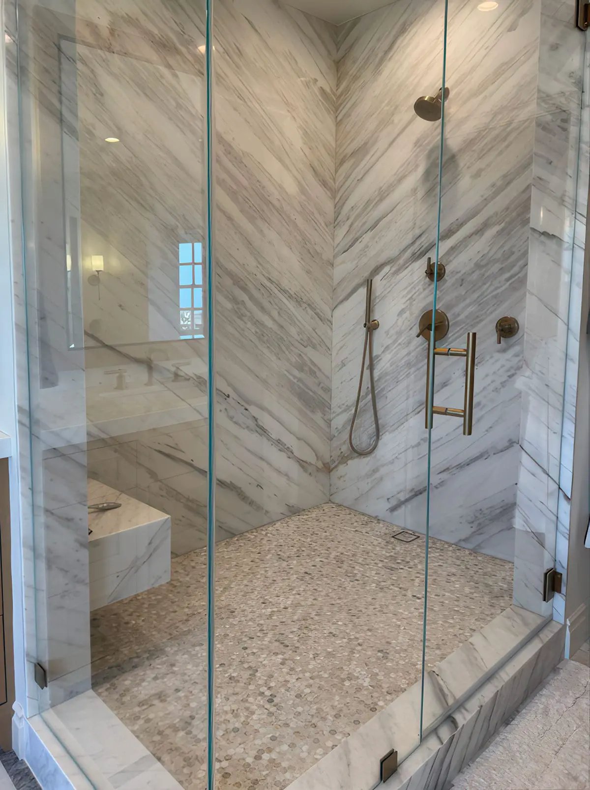 Athena Gold Penny Round Honed Marble Mosaics in a finished room