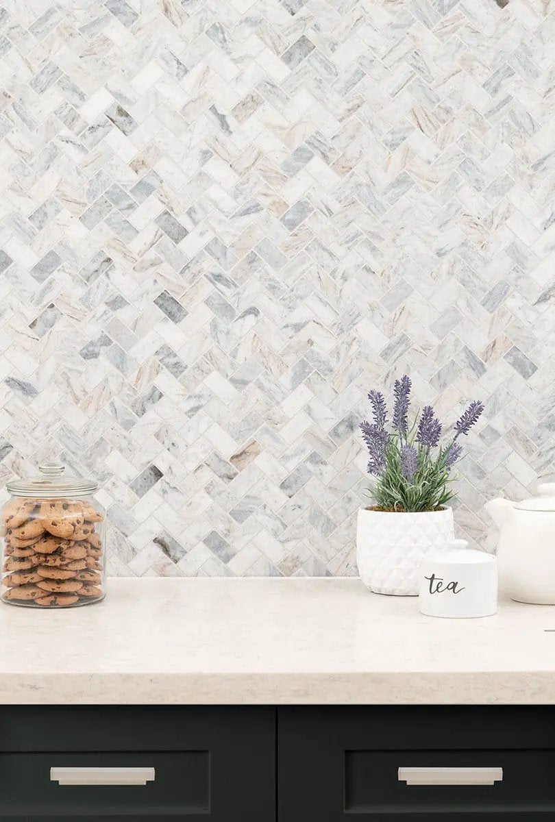 Capri Blue 1x2 Herringbone Honed Marble Mosaics in a finished room