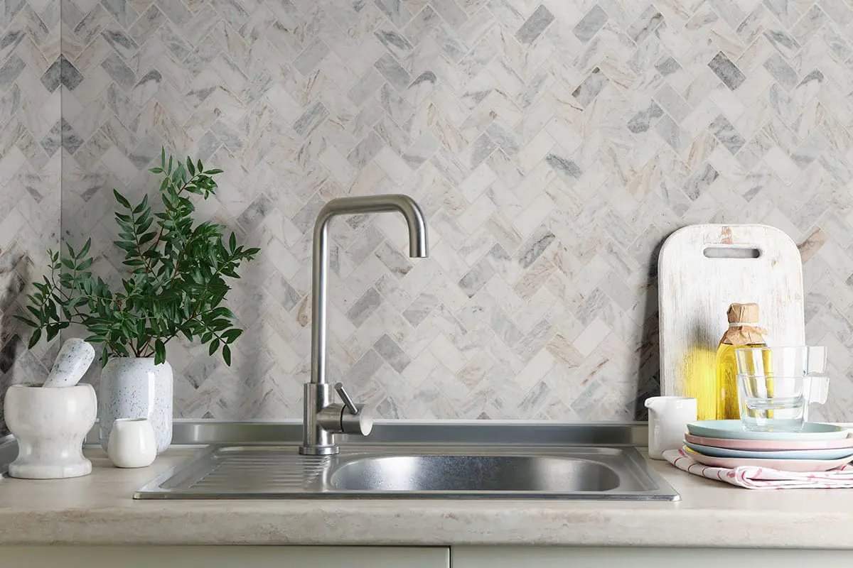 Capri Blue 1x2 Herringbone Honed Marble Mosaics in a finished room