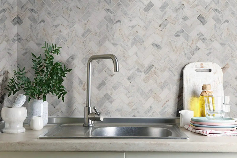 Capri Blue 1x2 Herringbone Honed Marble Mosaics in a finished room