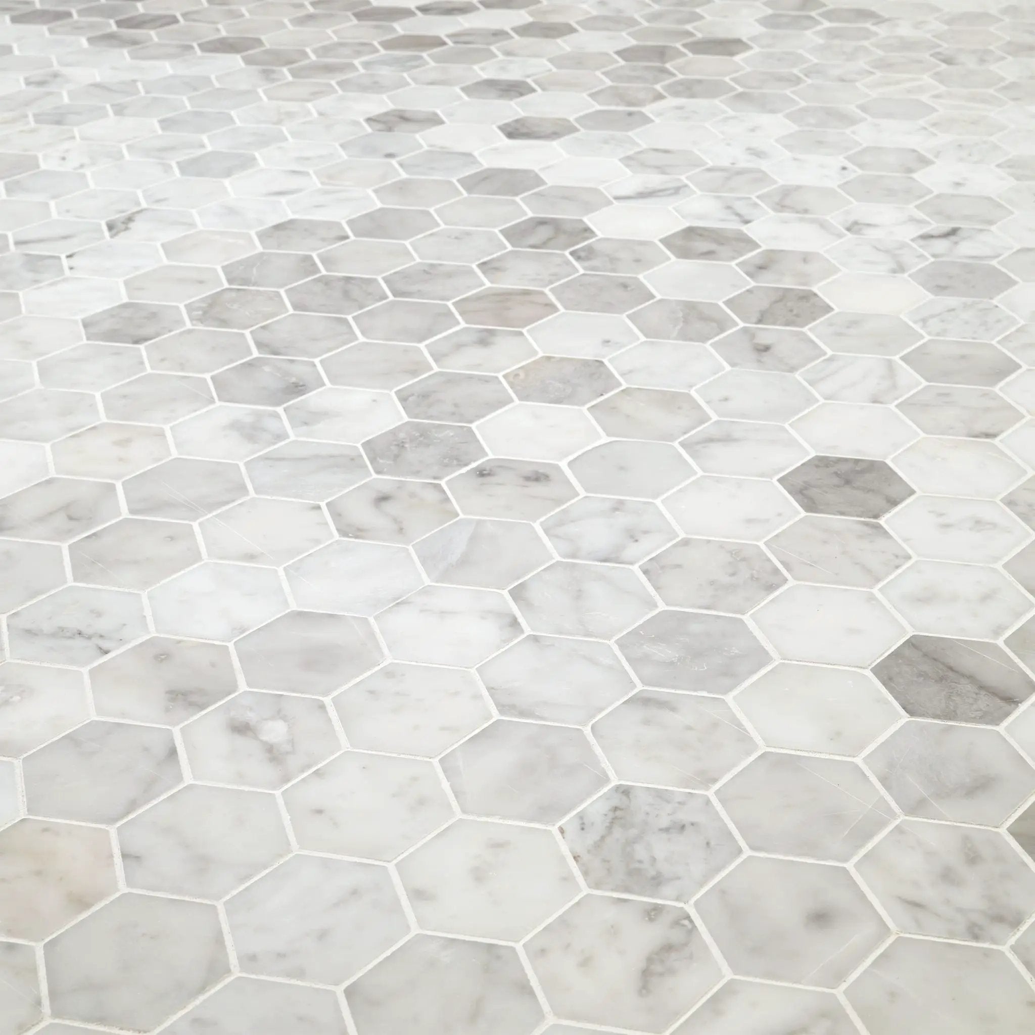 Carrara White Honed 2" Hexagon Mosaic Tile Marble angled view
