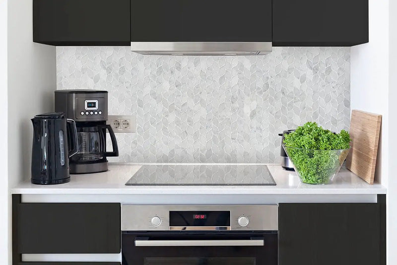 Carrara White Blanco Pattern Honed Marble Mosaics in a finished room