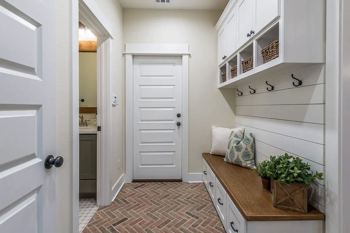 Noble Red Clay Brick Tile 2.25x7.5 Tumbled Corner Mosaics 2.25x10.75 in a finished room