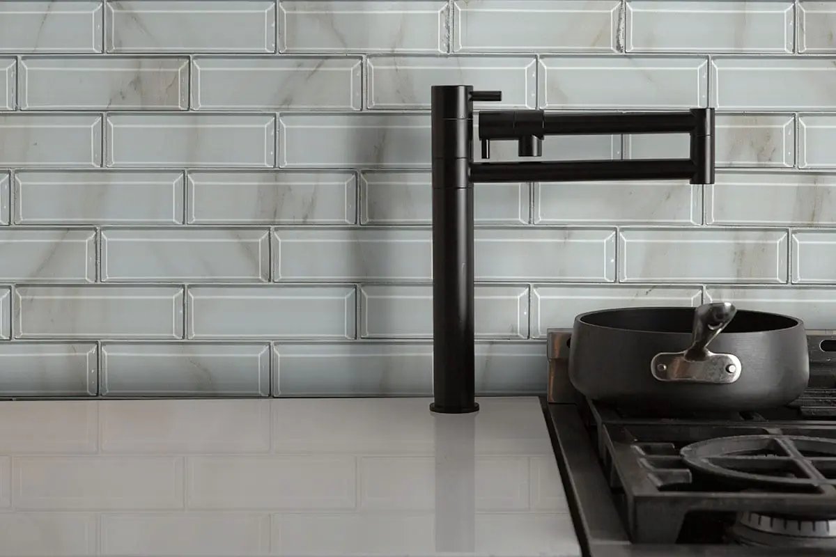 Ivory Amber Beveled Subway Tile Glossy Pattern Glass Mosaics in a finished room