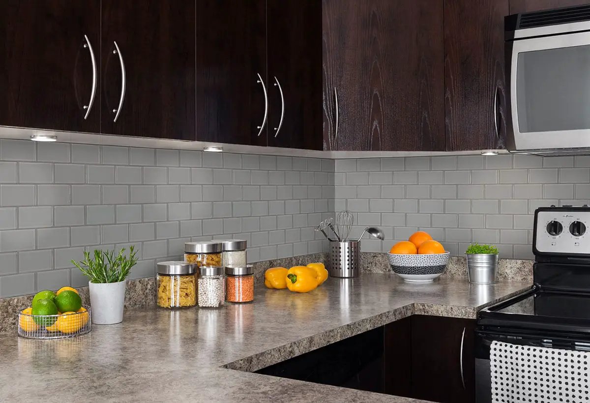 Oyster Gray Subway Tile 2x4 Glass Mosaics in a finished room