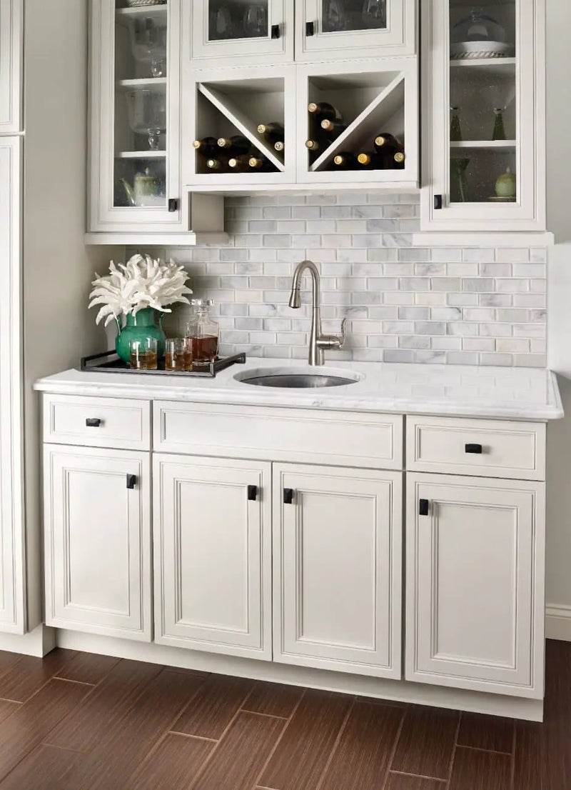 Greecian White Beveled Subway Tile 2x4 Marble Mosaics in a finished room