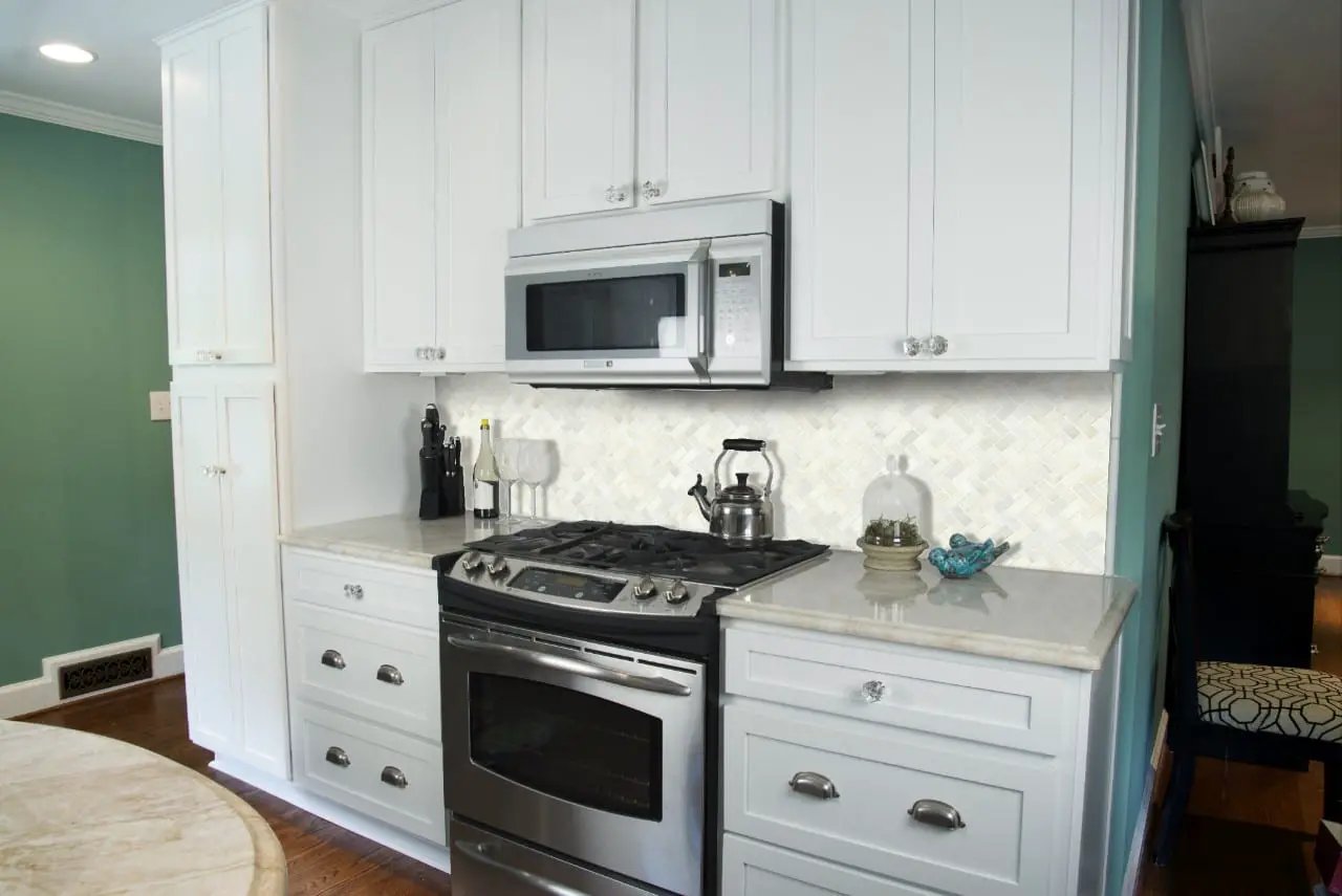 Greecian White Herringbone Pattern Polished Marble Mosaics in a finished room