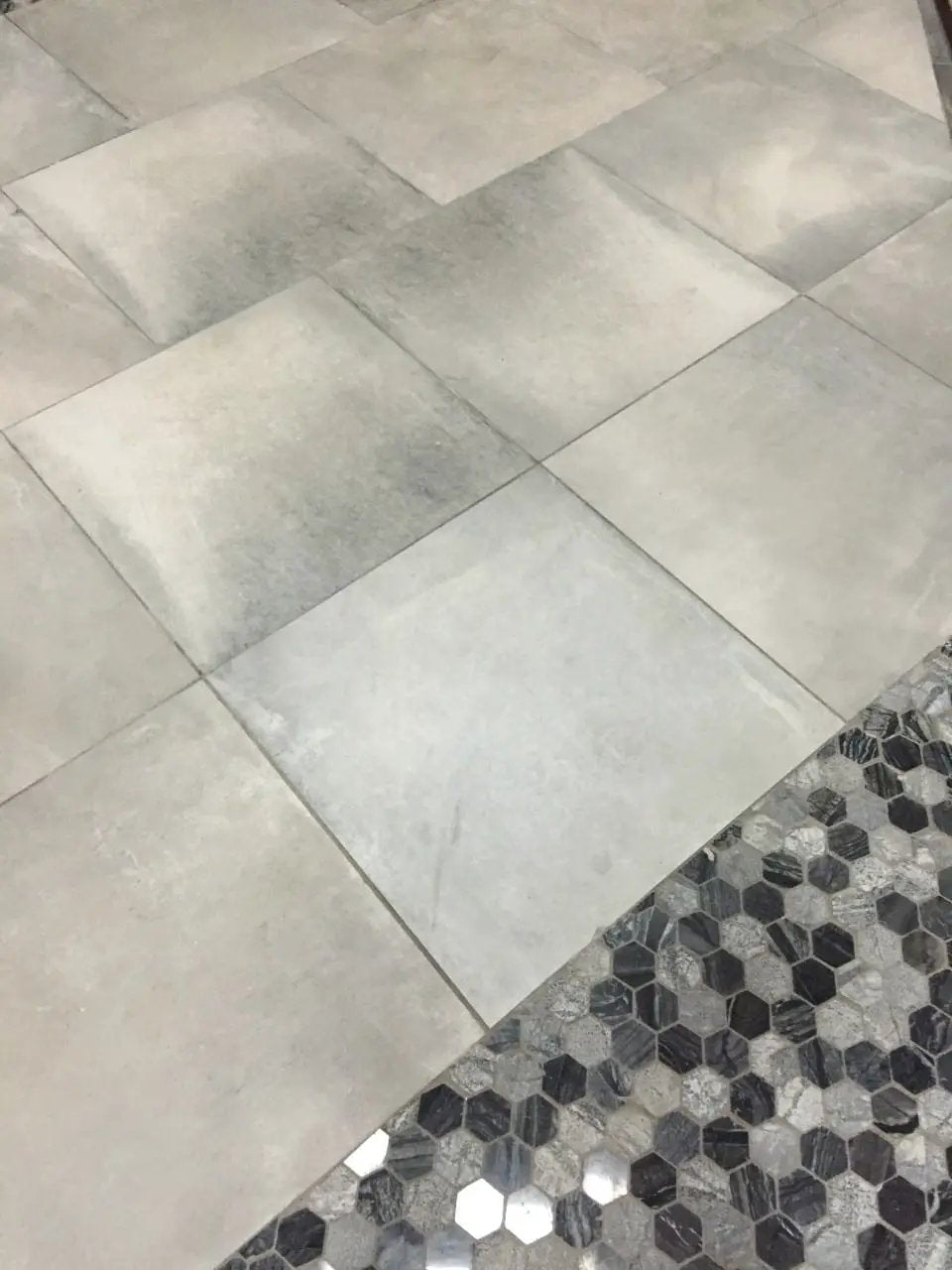 Henley Multi Finish Hexagon Mosaic Tile Marble in a finished room