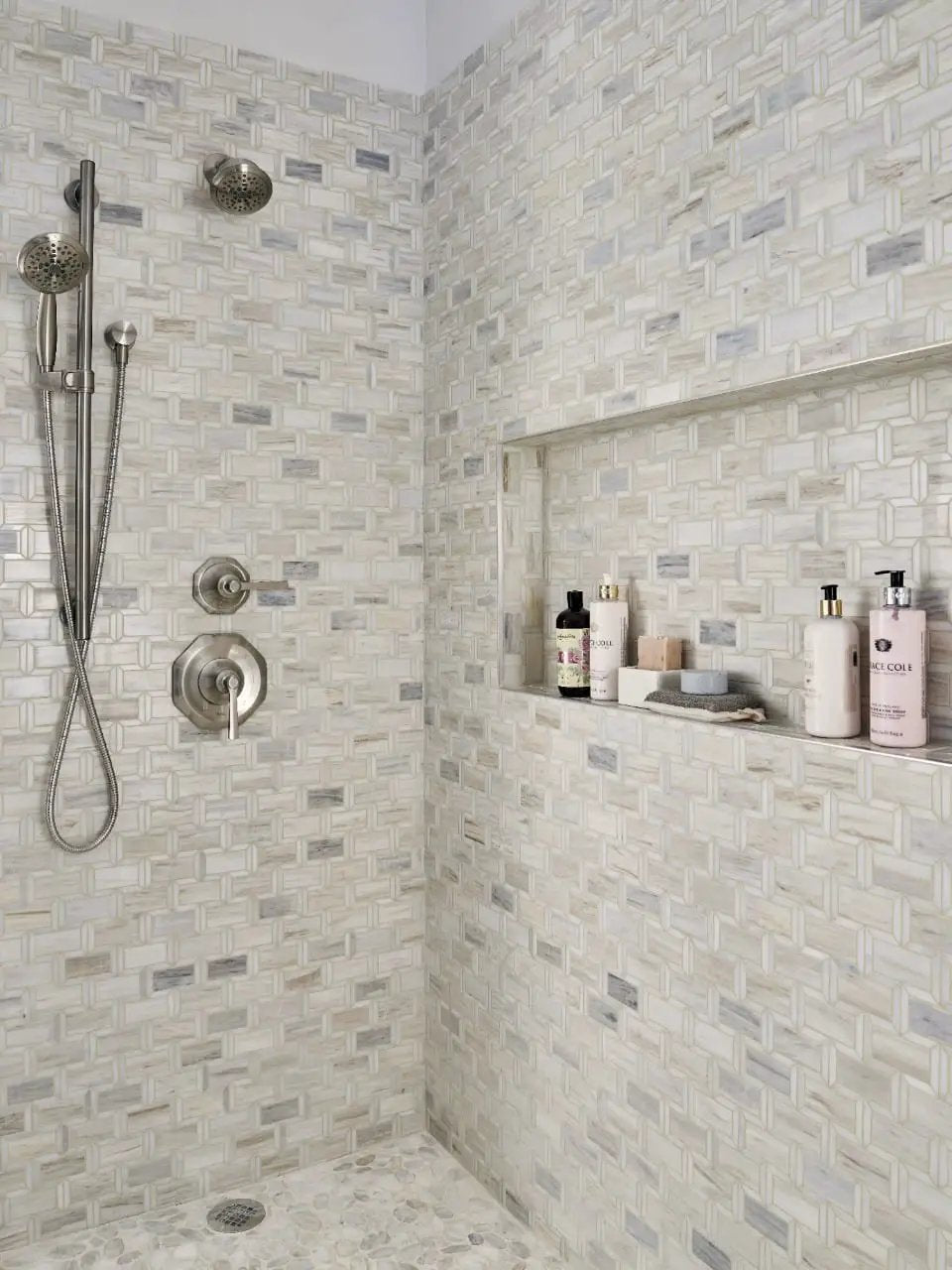 Dorado Pebble Tumbled 10mm Pattern Marble Mosaics in a finished room