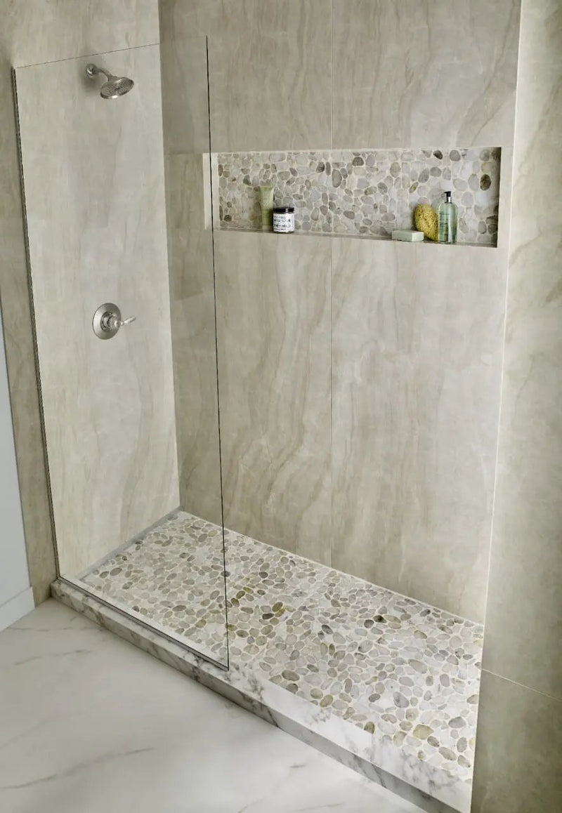 Dorado Pebble Tumbled 10mm Pattern Marble Mosaics in a finished room