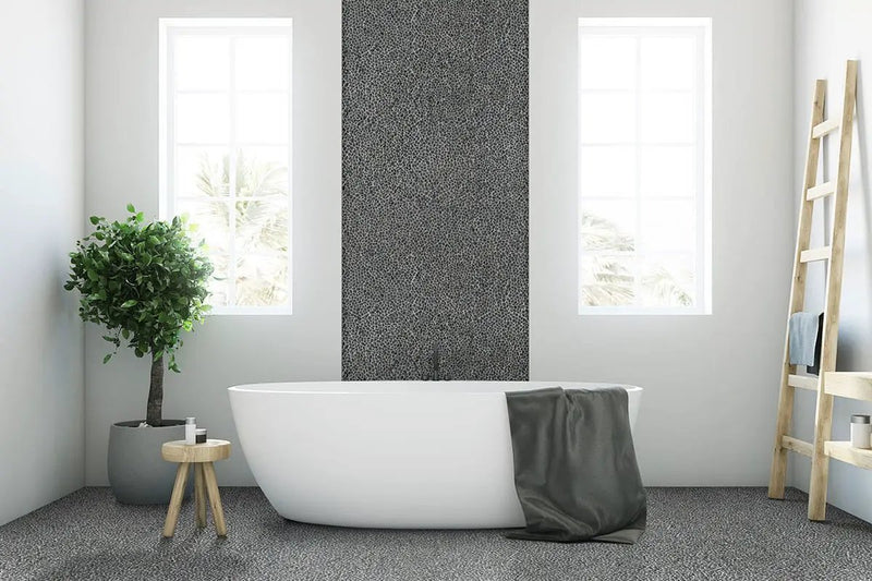 Noir Ash Mini Pebble Tumbled Marble Mosaics in a finished room