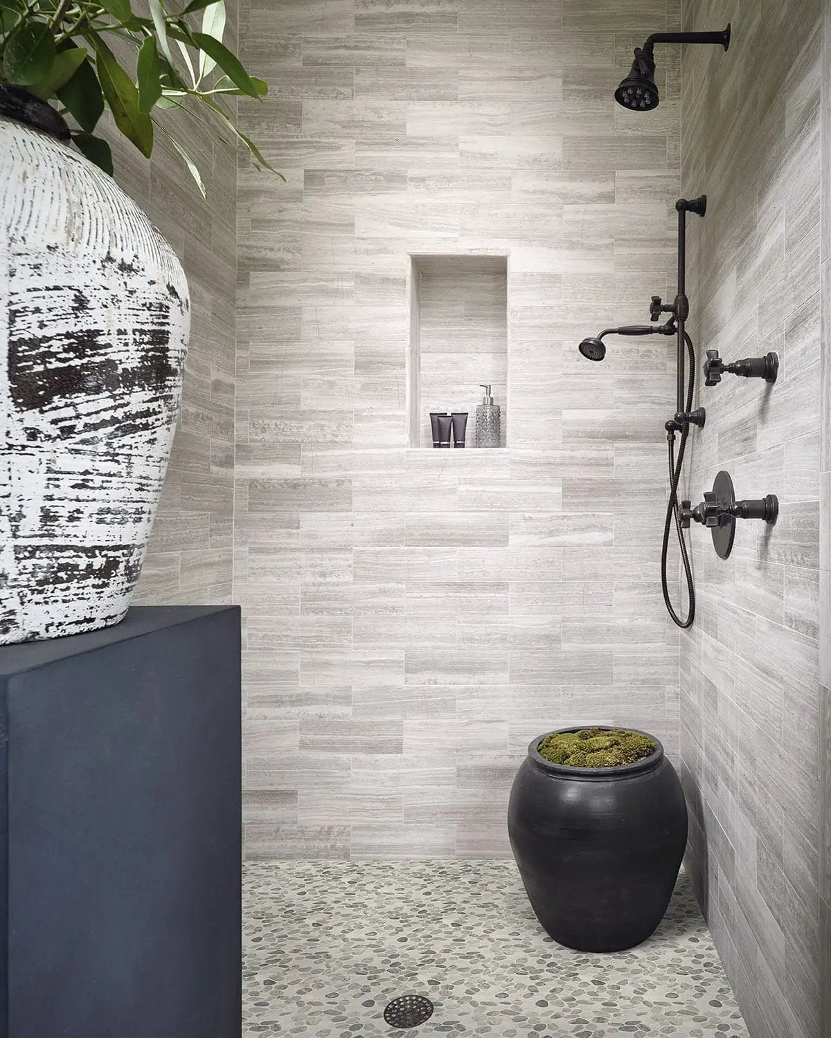 Puebla Greige Pebble Tumbled Pattern Marble Mosaics in a finished room