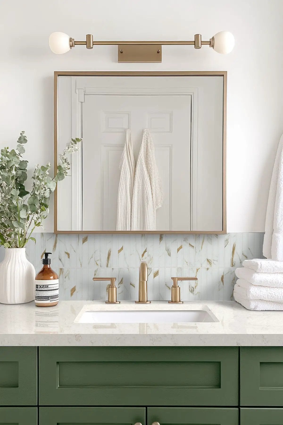 Calacatta Gold Matte 1x6 Stack Pattern Porcelain Mosaics in a finished room