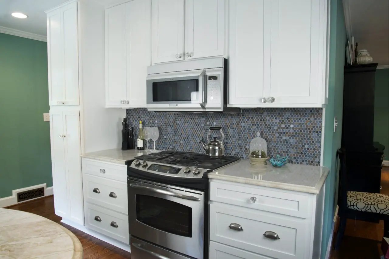 Penny Round Azul Glossy Porcelain Mosaics in a finished room