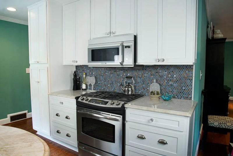 Penny Round Azul Glossy Porcelain Mosaics in a finished room